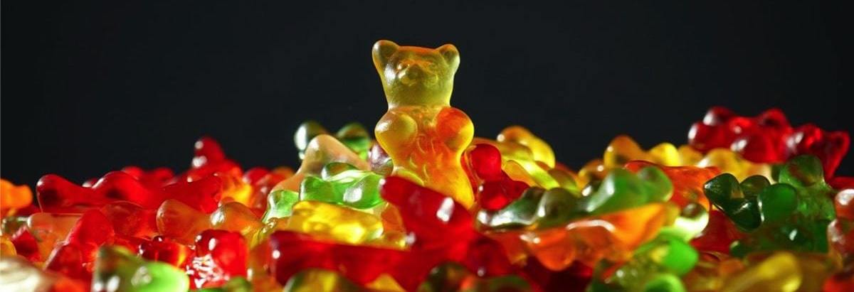 multi-coloured sweets with a teddybear shape standing out