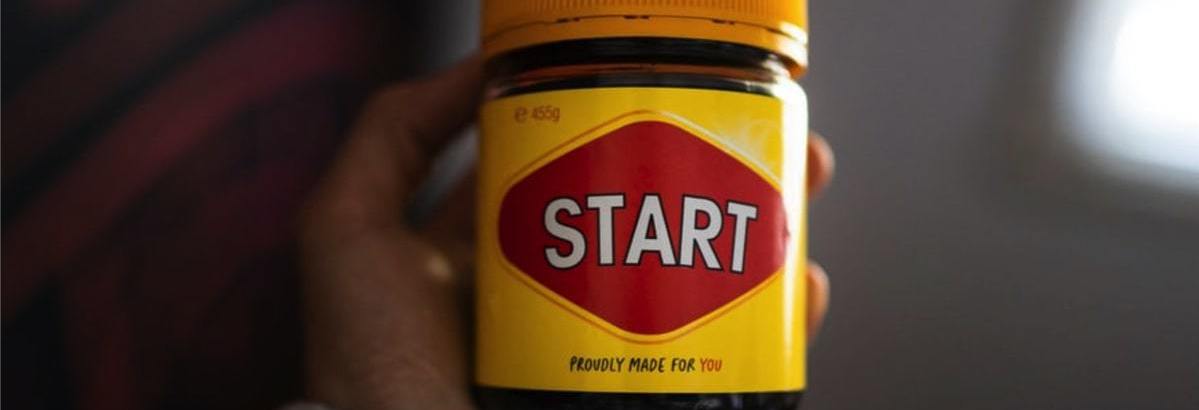 Marmite-style jar with the word 'start' on the label